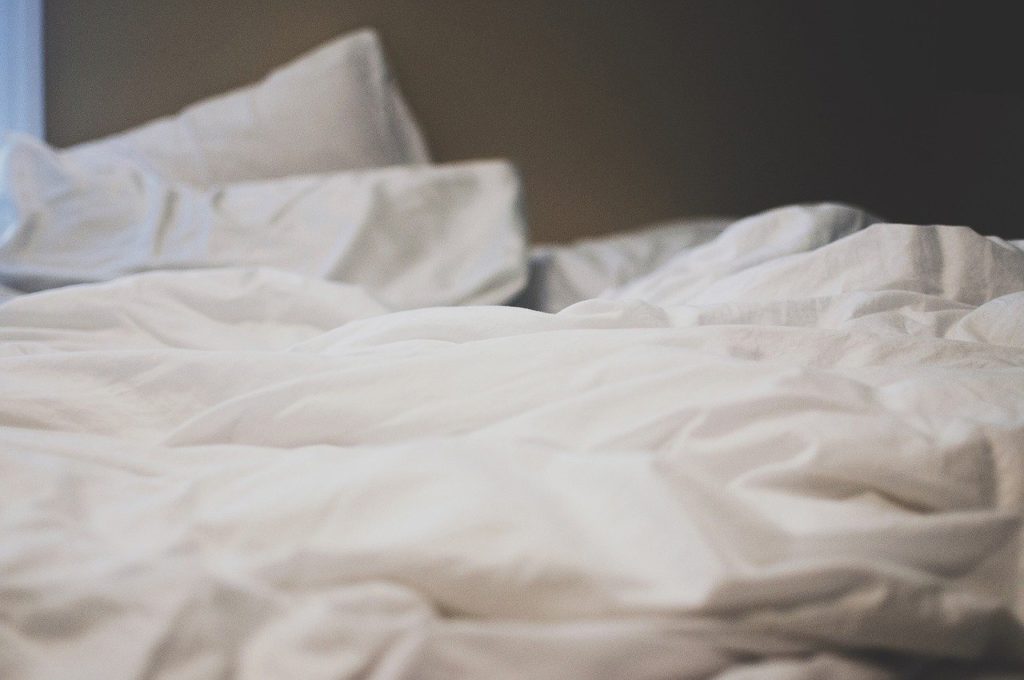 bed, sheets, pillows